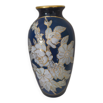 Cobalt blue porcelain vase from Limoges, France with floral pattern.
