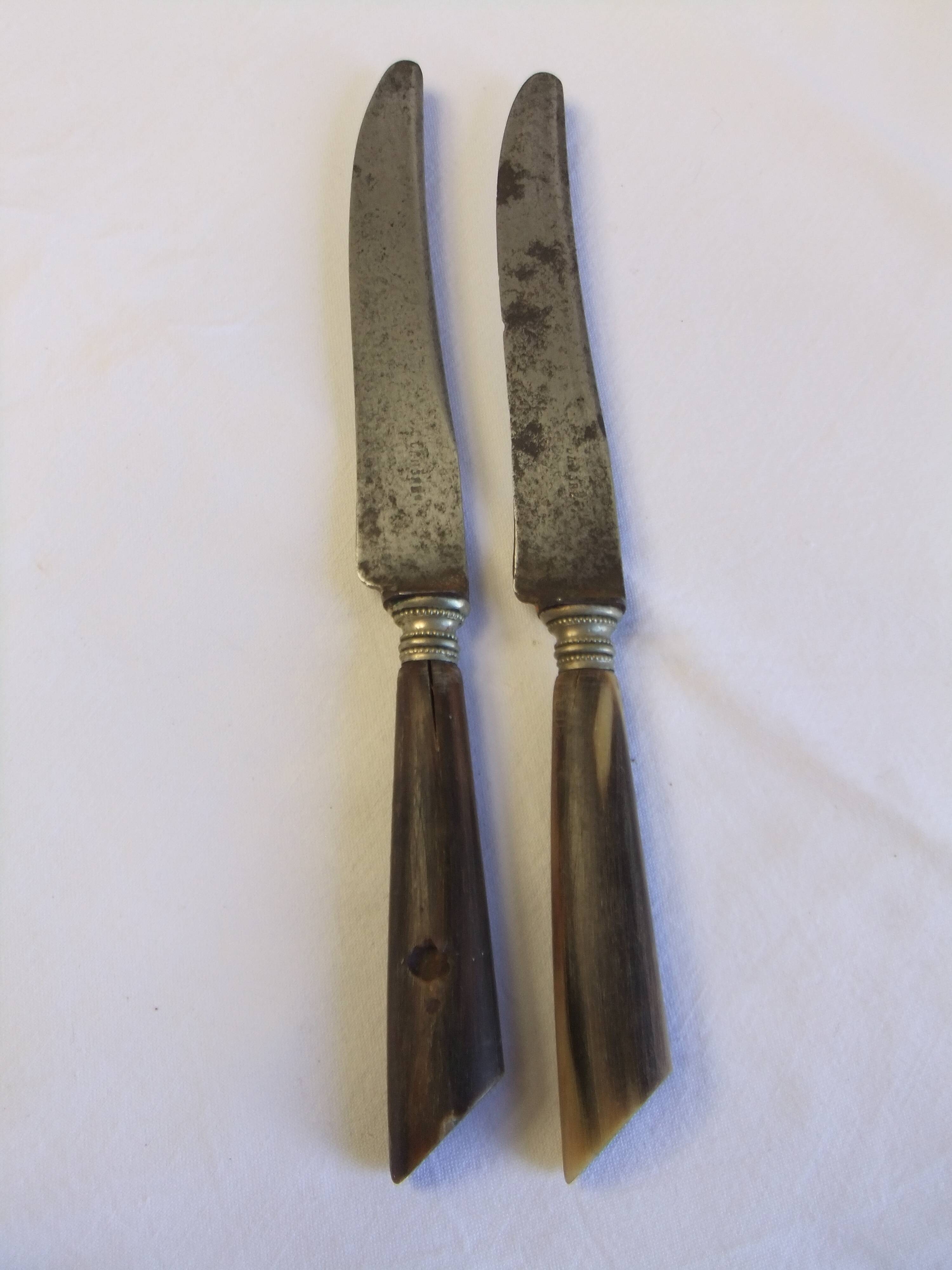 Table service knives old steel blade horn ferrule