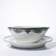 Old Lunéville sauce boat, opaque porcelain with polychrome decoration.