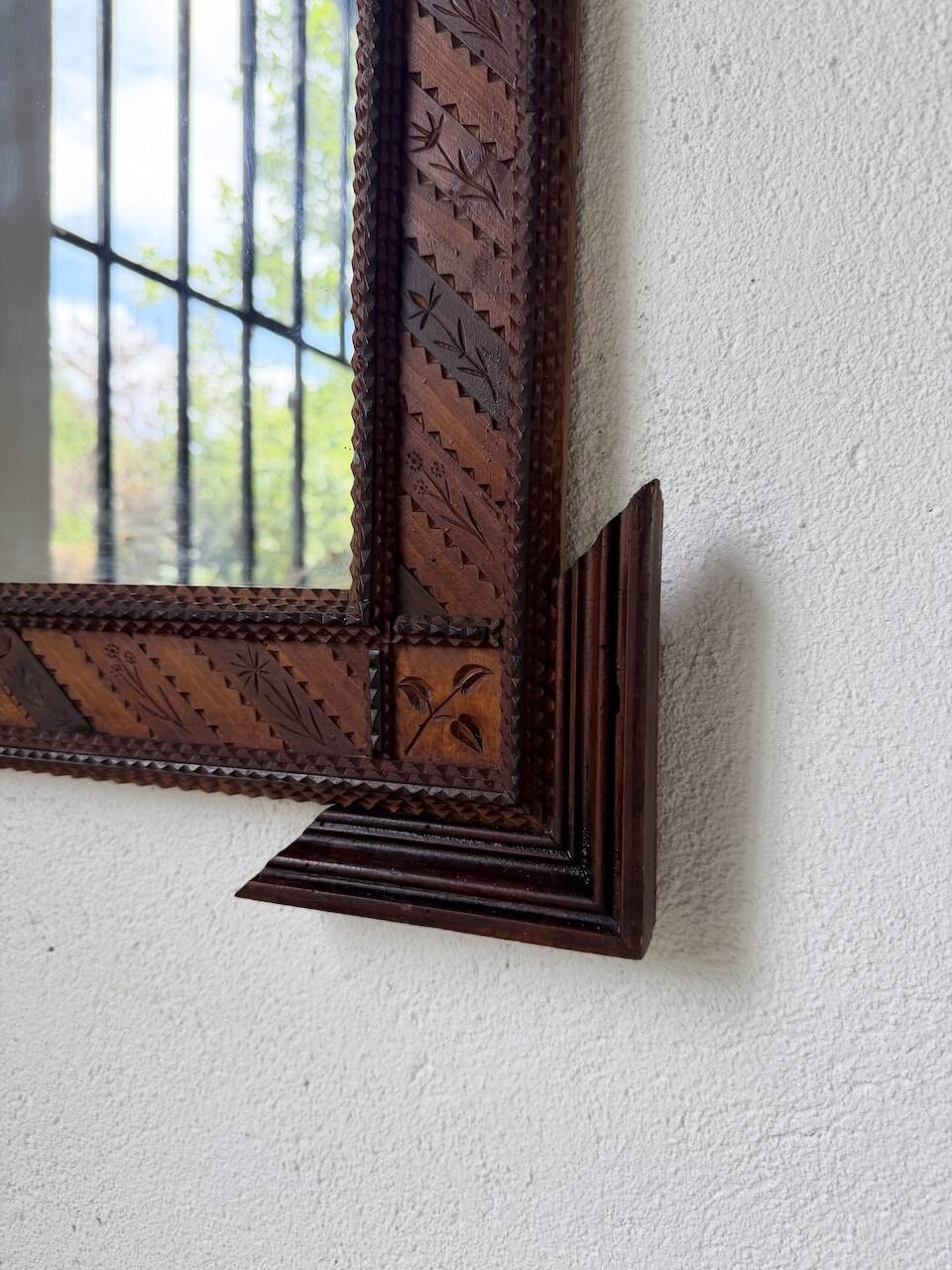 Pair of wooden mirrors in tramp art style