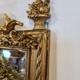 Mirror with an angel in gilded wood and stucco 166x61cm