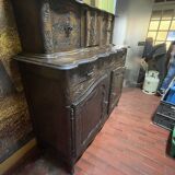 Curved sliding sideboard