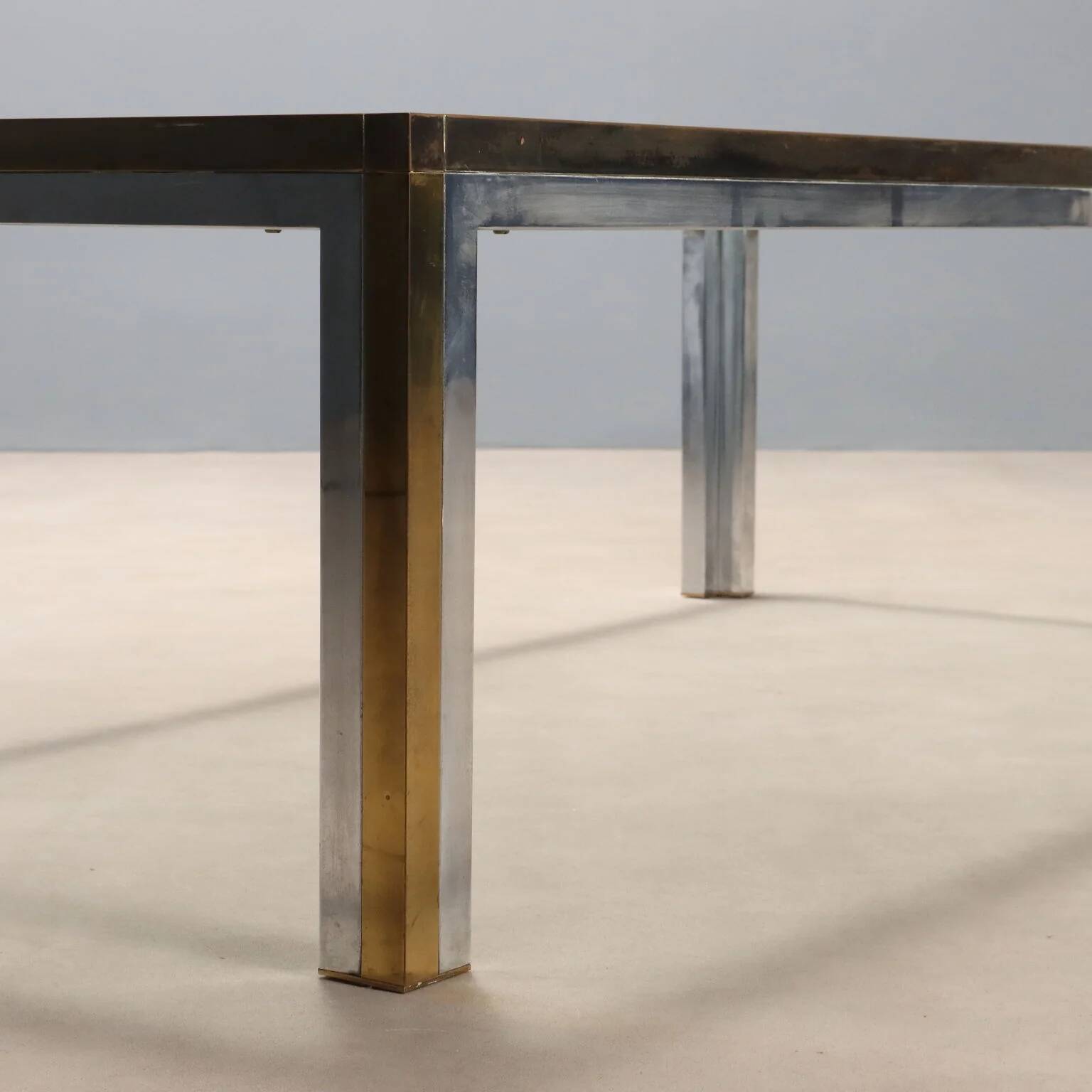Vintage coffee table in metal, brass and glass, 1970s design.