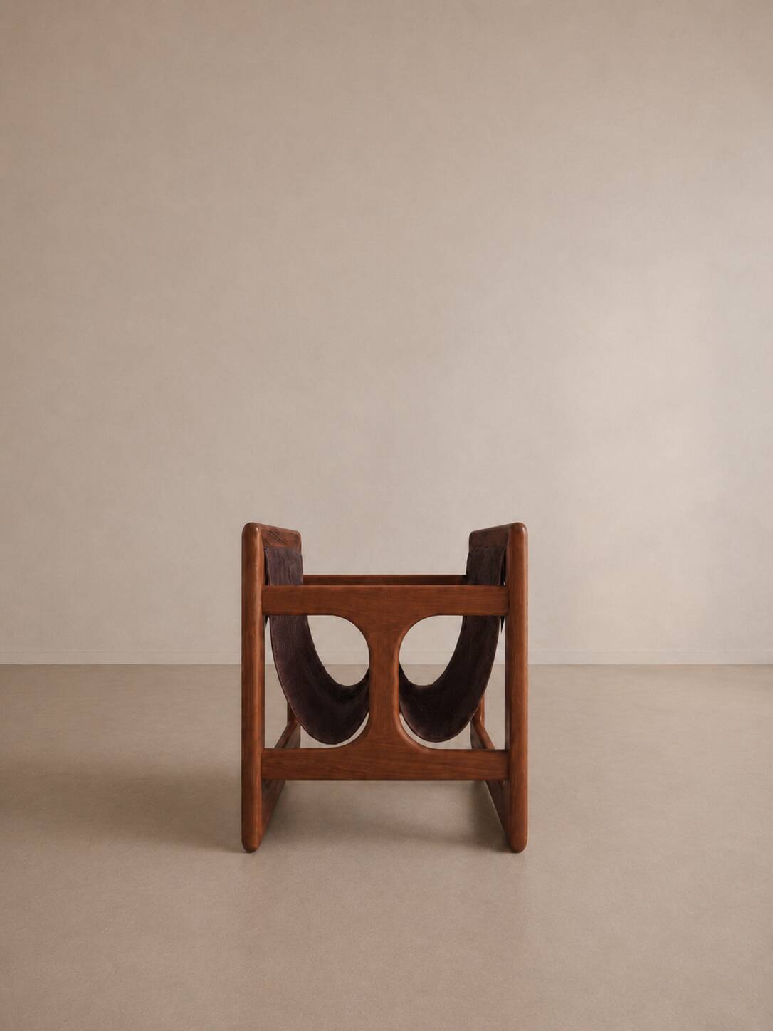 Teak and suede magazine rack by Aksel Kjersgaard for Salin møbler.