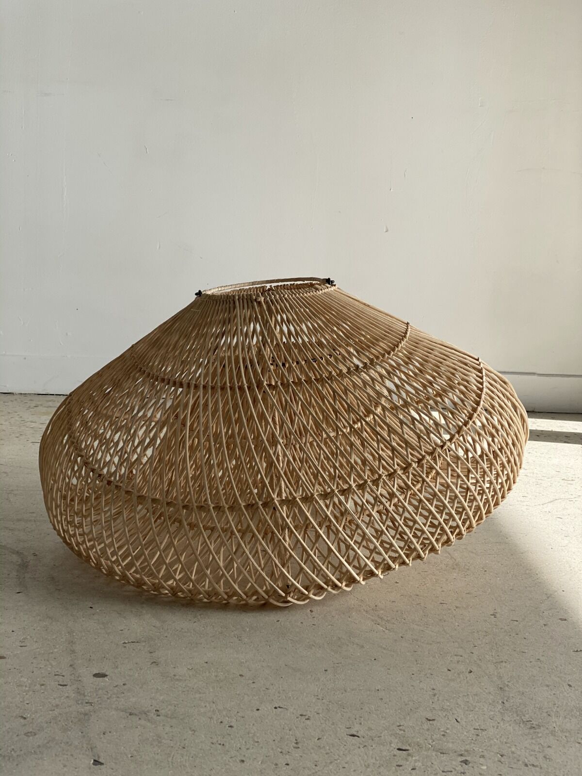 Small rattan lampshade in the shape of a braided hat