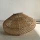 Small rattan lampshade in the shape of a braided hat