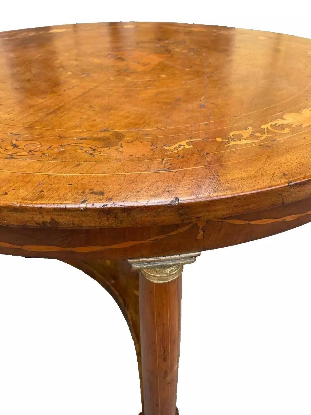 Antique round marquetry Empire table from the early 19th century