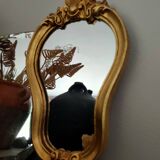 Baroque style gilded mirror.