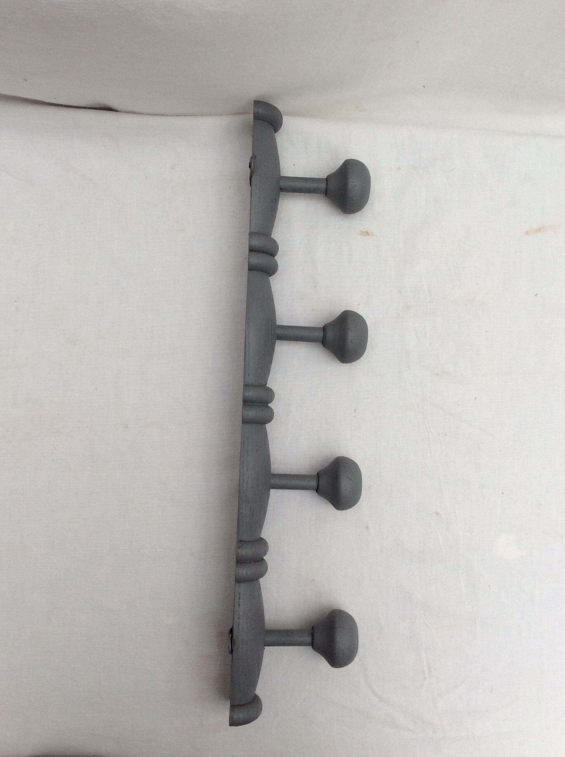 Grey wooden coat rack