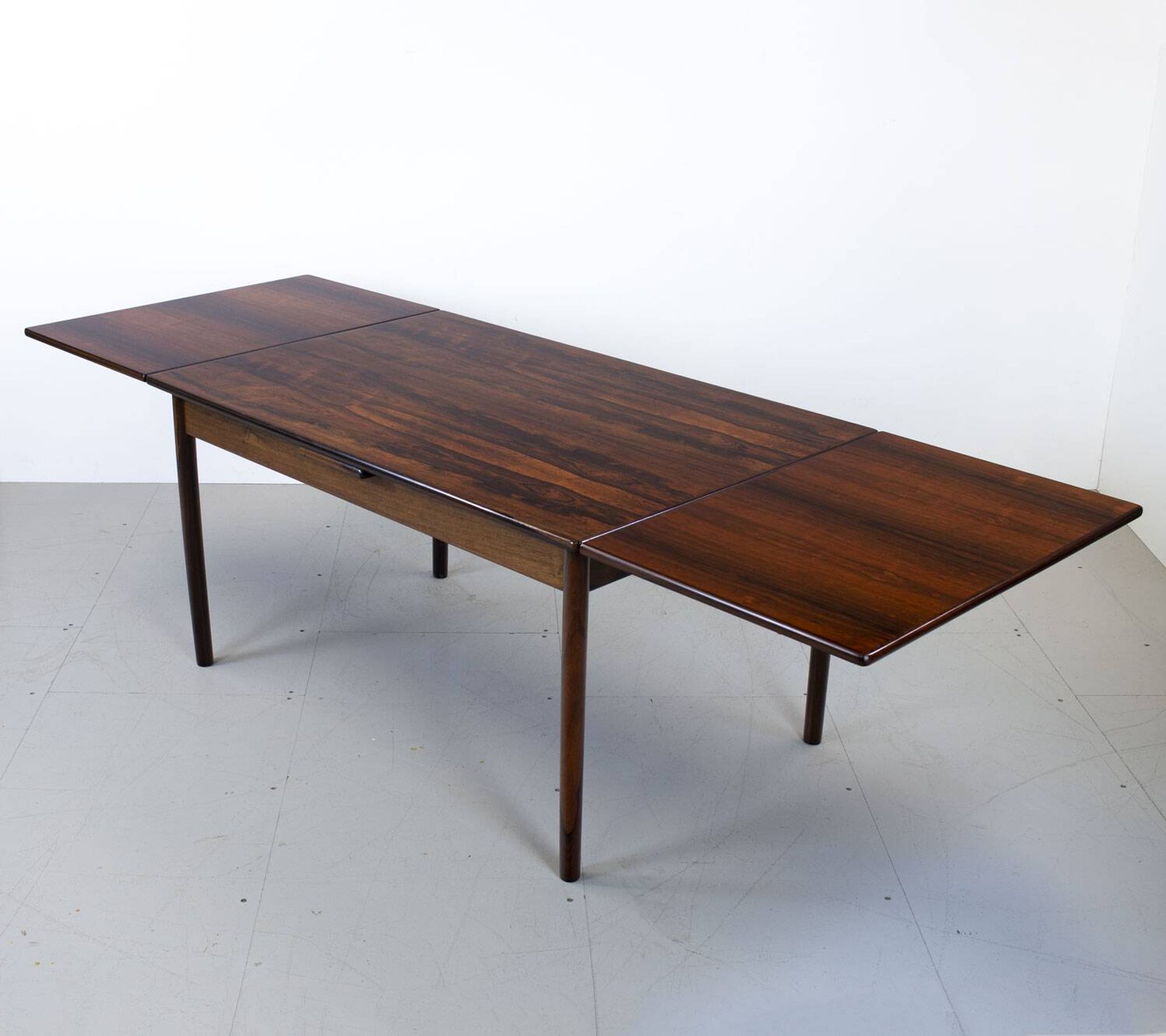 Table à manger extensible en palissandre danois du milieu du siècle