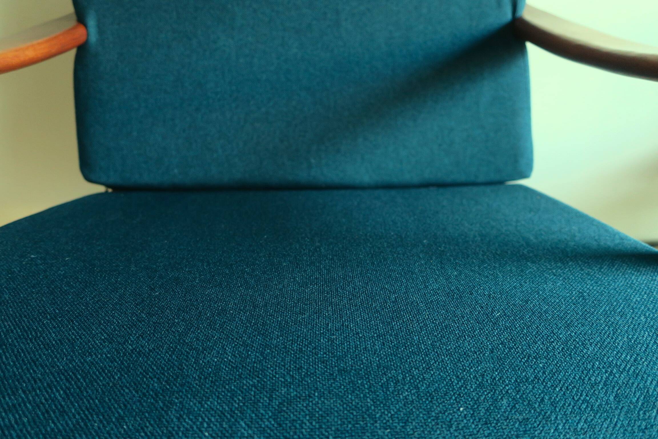 Danish teak lounge chair with blue-green cushions, 1960s