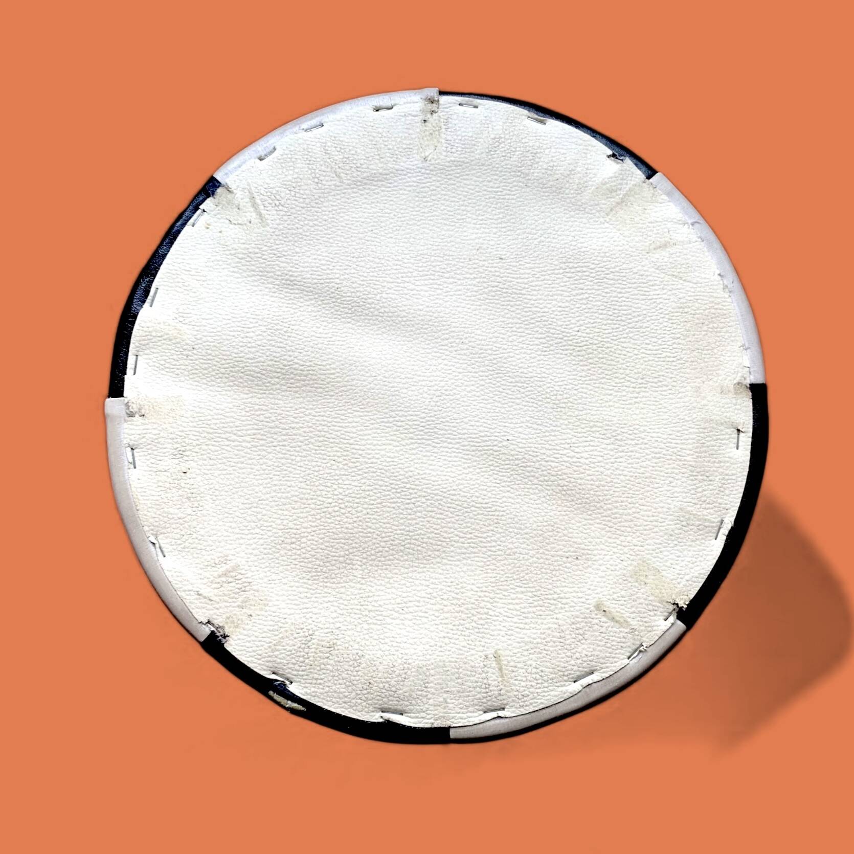 Vintage round pouf in black and white skai