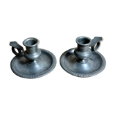 Pair of tin candle holders signed