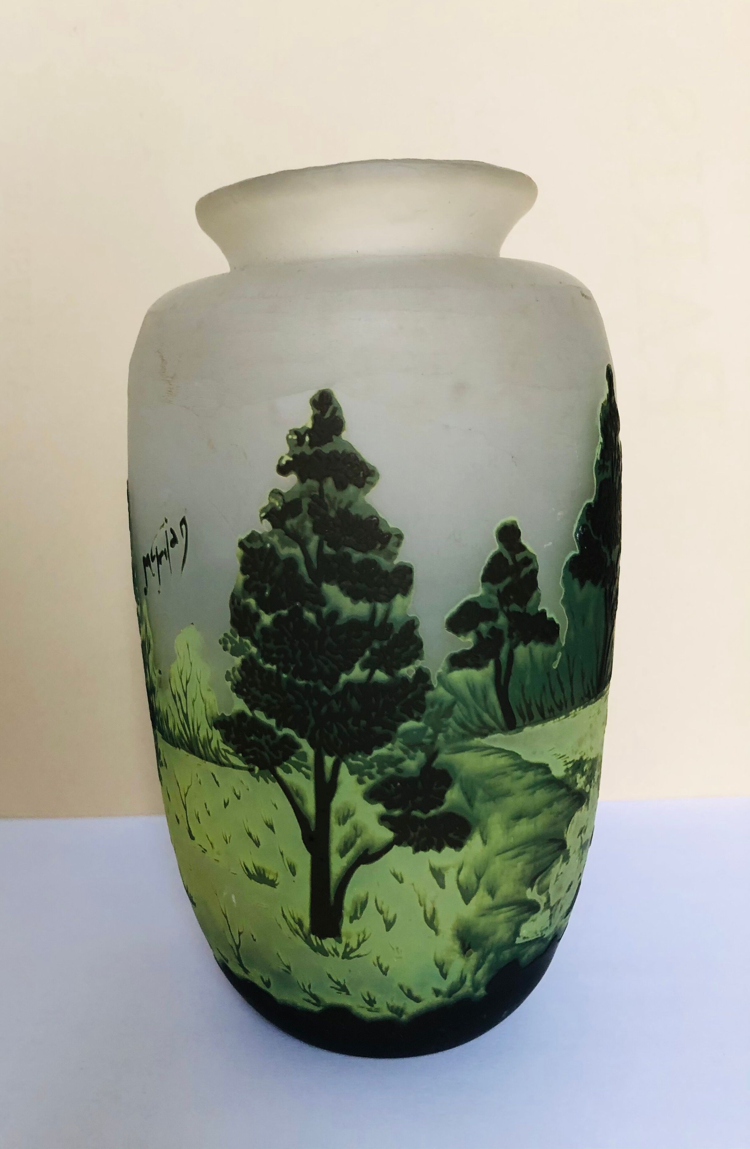 Multilayered glass vase engraved with acid
