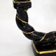 Pair of earthenware braided rope candlesticks