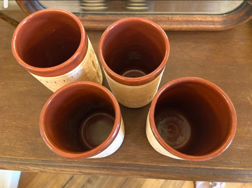 Four hand-sculpted ceramic glasses
