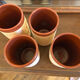 Four hand-sculpted ceramic glasses