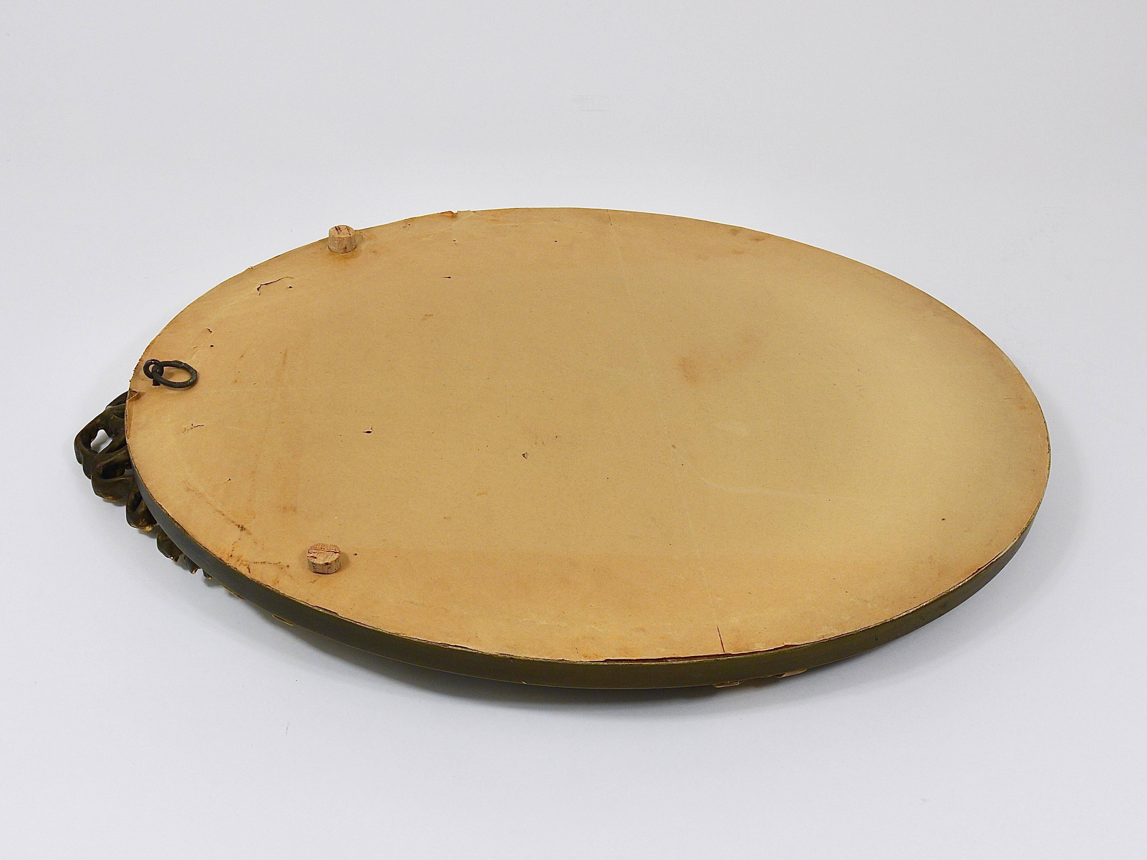 Faceted wall mirror in neoclassical Gustavian style, oval, in gilded wood, Italy, 1900s.