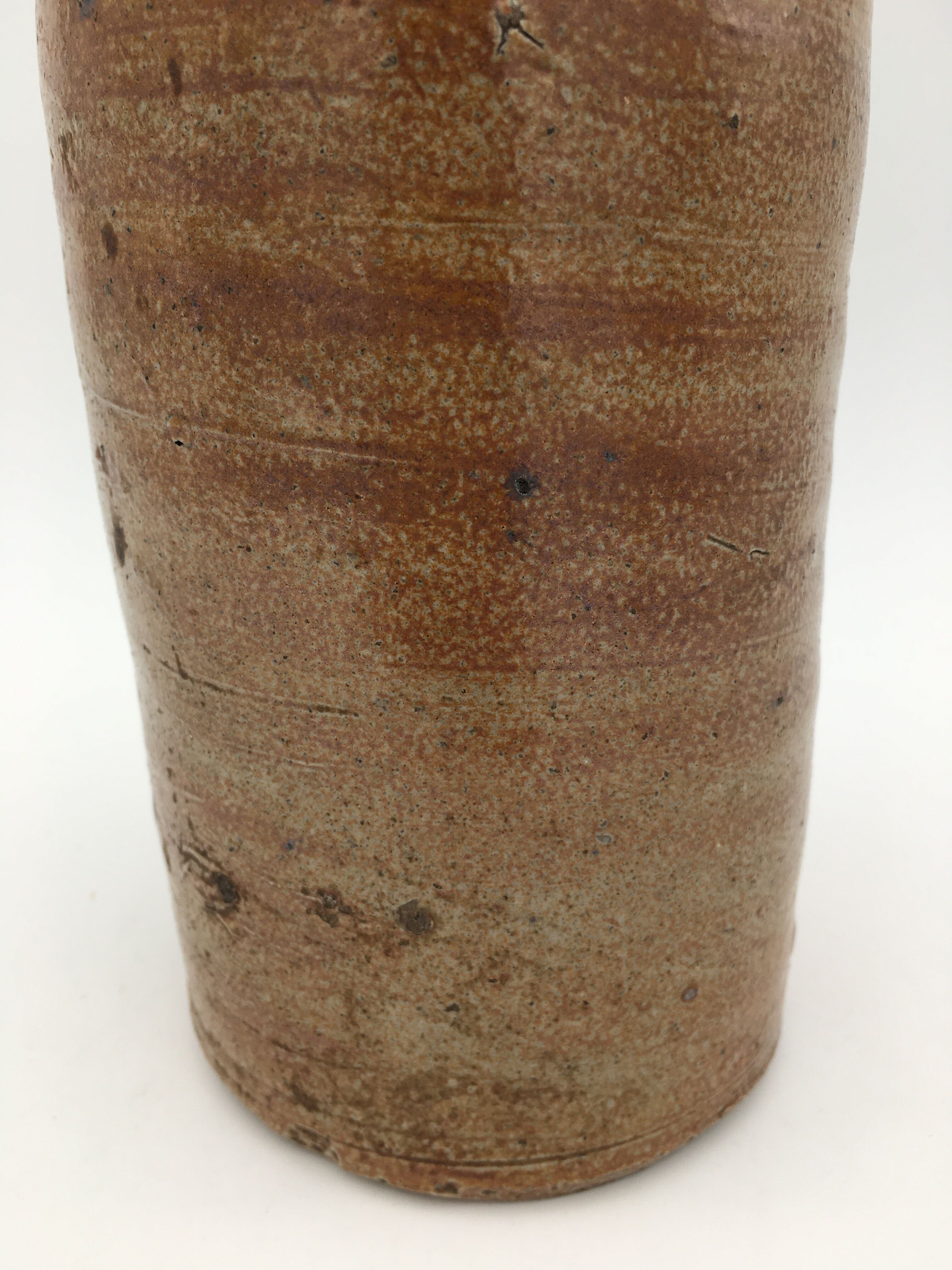 Old glazed terracotta bottle, early 20th century