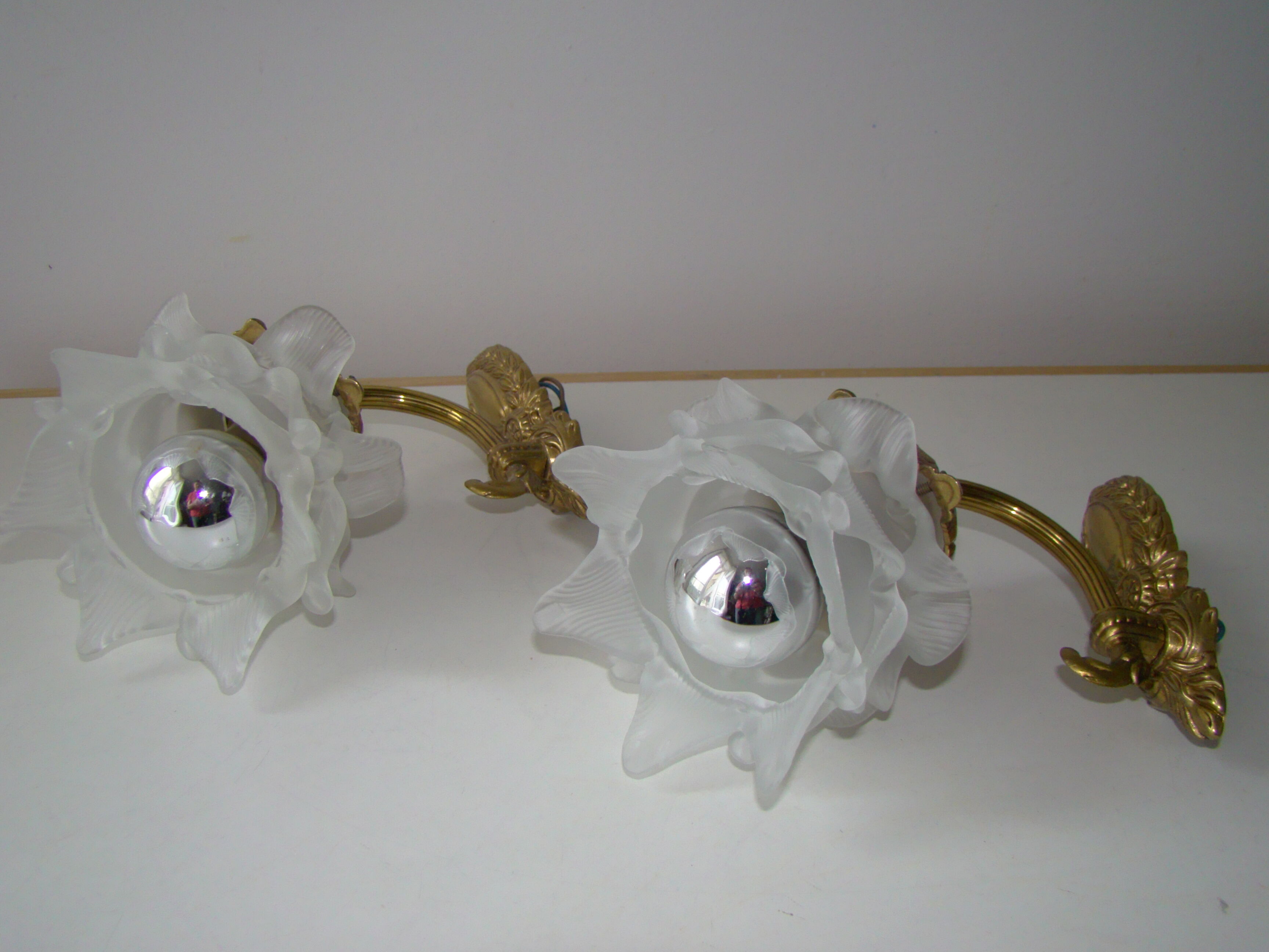 Pair of tanned sconces and glass paste