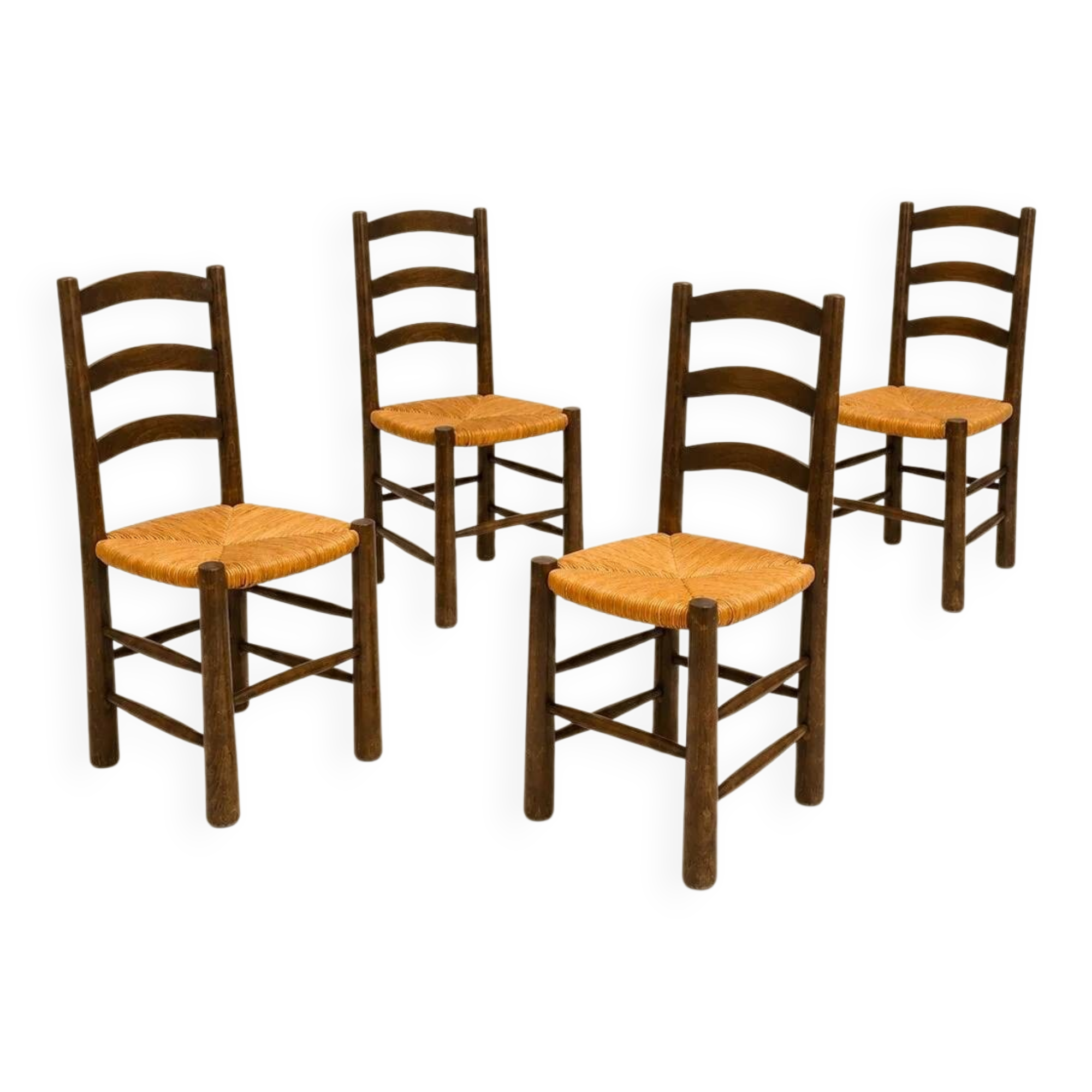 Set of four chairs in the style of Perriand.