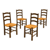 Set of four chairs in the style of Perriand.
