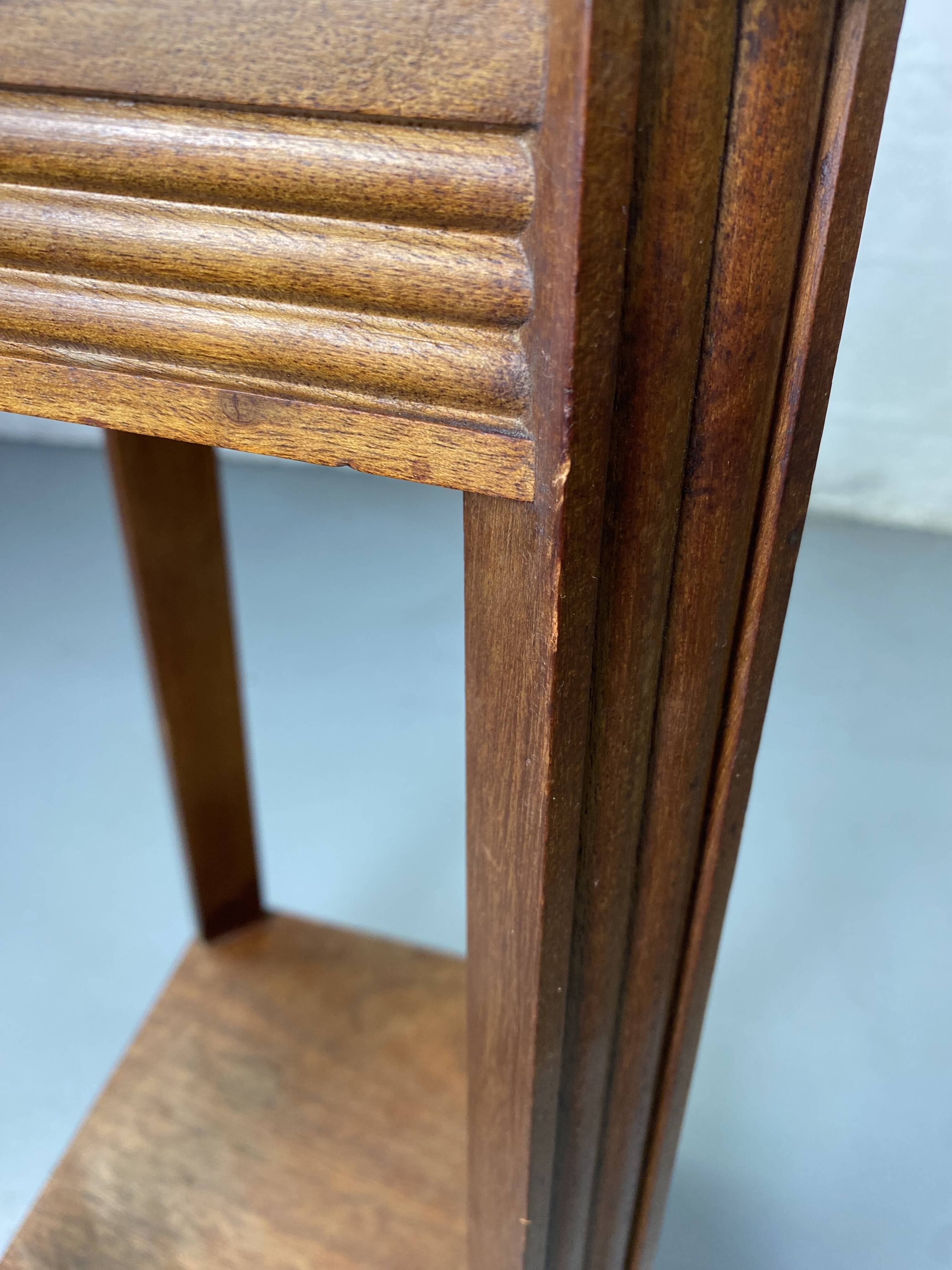 Wooden stool with marble top