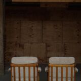 Henning Kjærnulf, lounge chairs in oak and lambswool, mid-century Danish, 1960s.