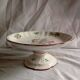 Plat a biscuit sur pied en faience de luneville