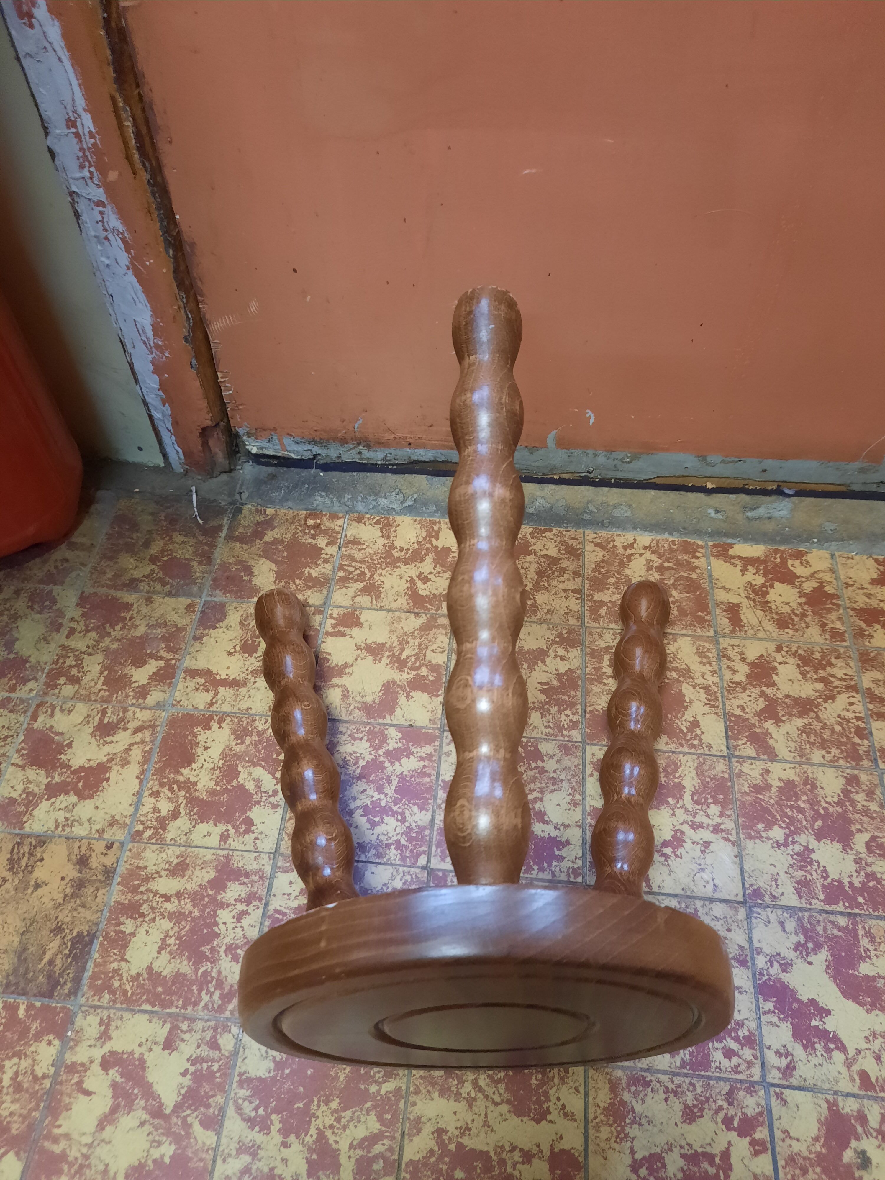 Wooden tripod stool