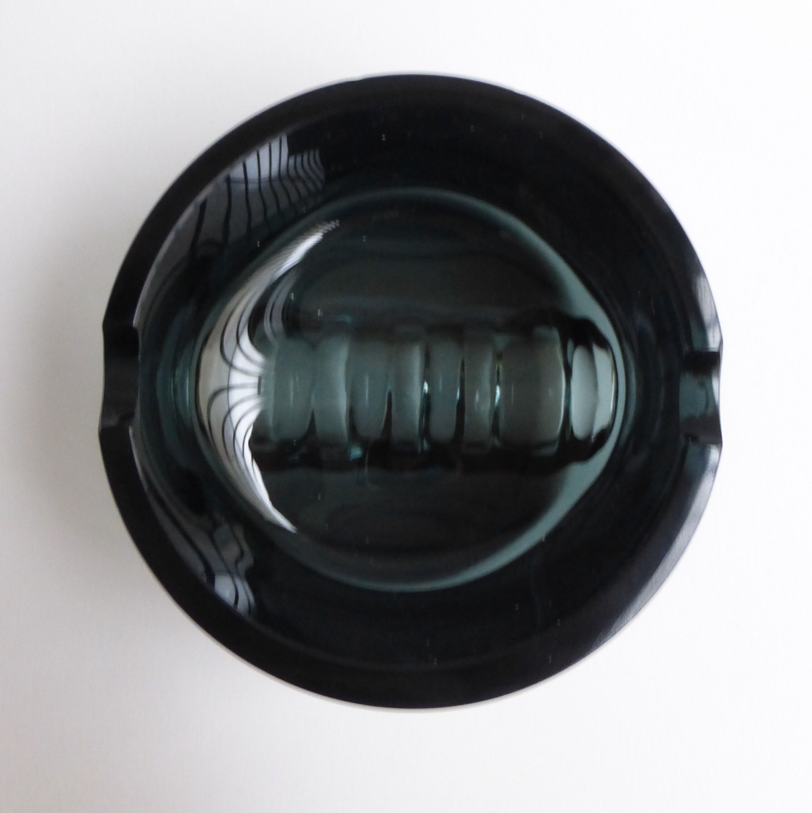 Scandinavian ashtray in 1970's moulded smoked glass