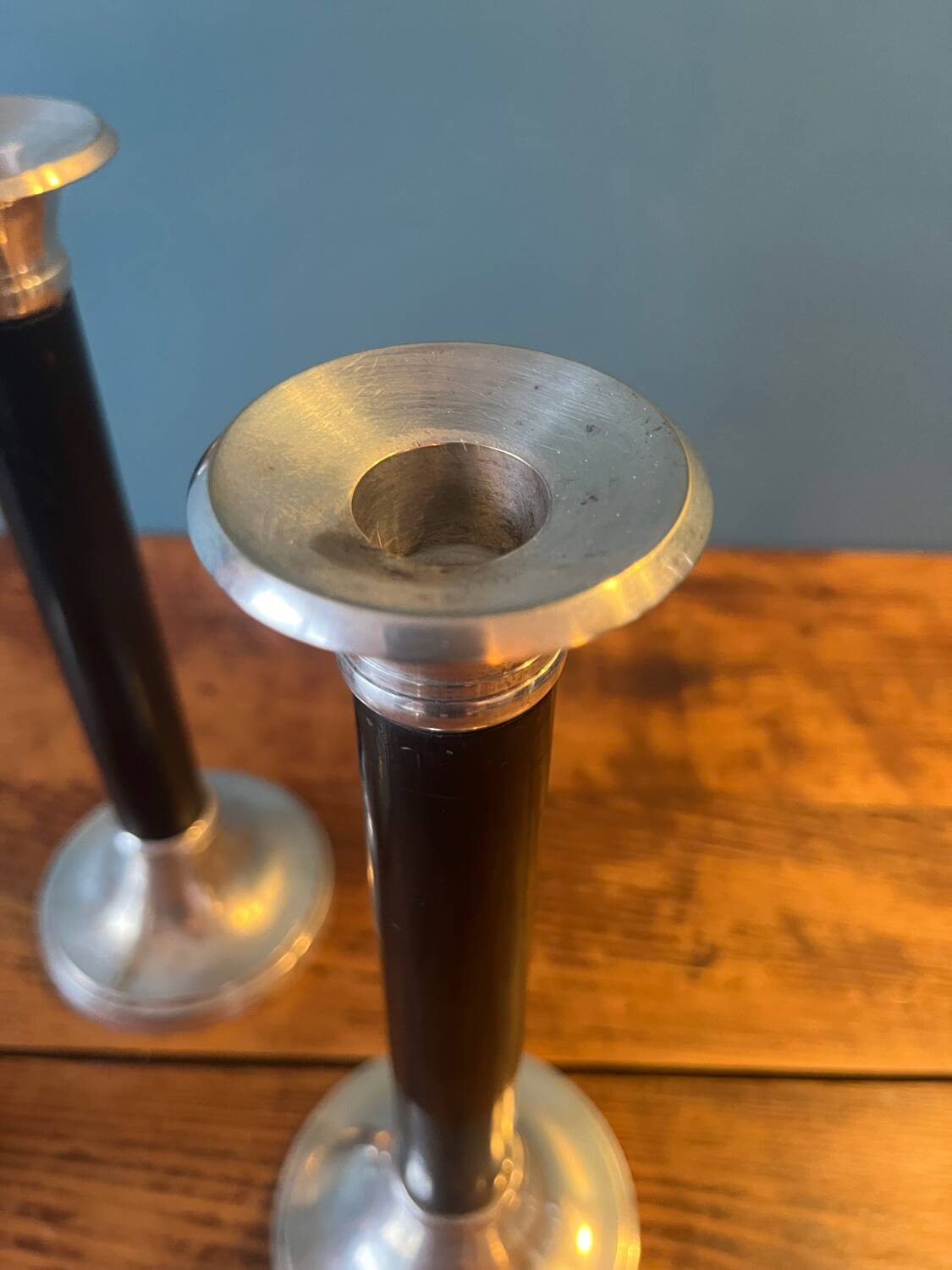 Trio of metal and wood candlesticks from the 80s