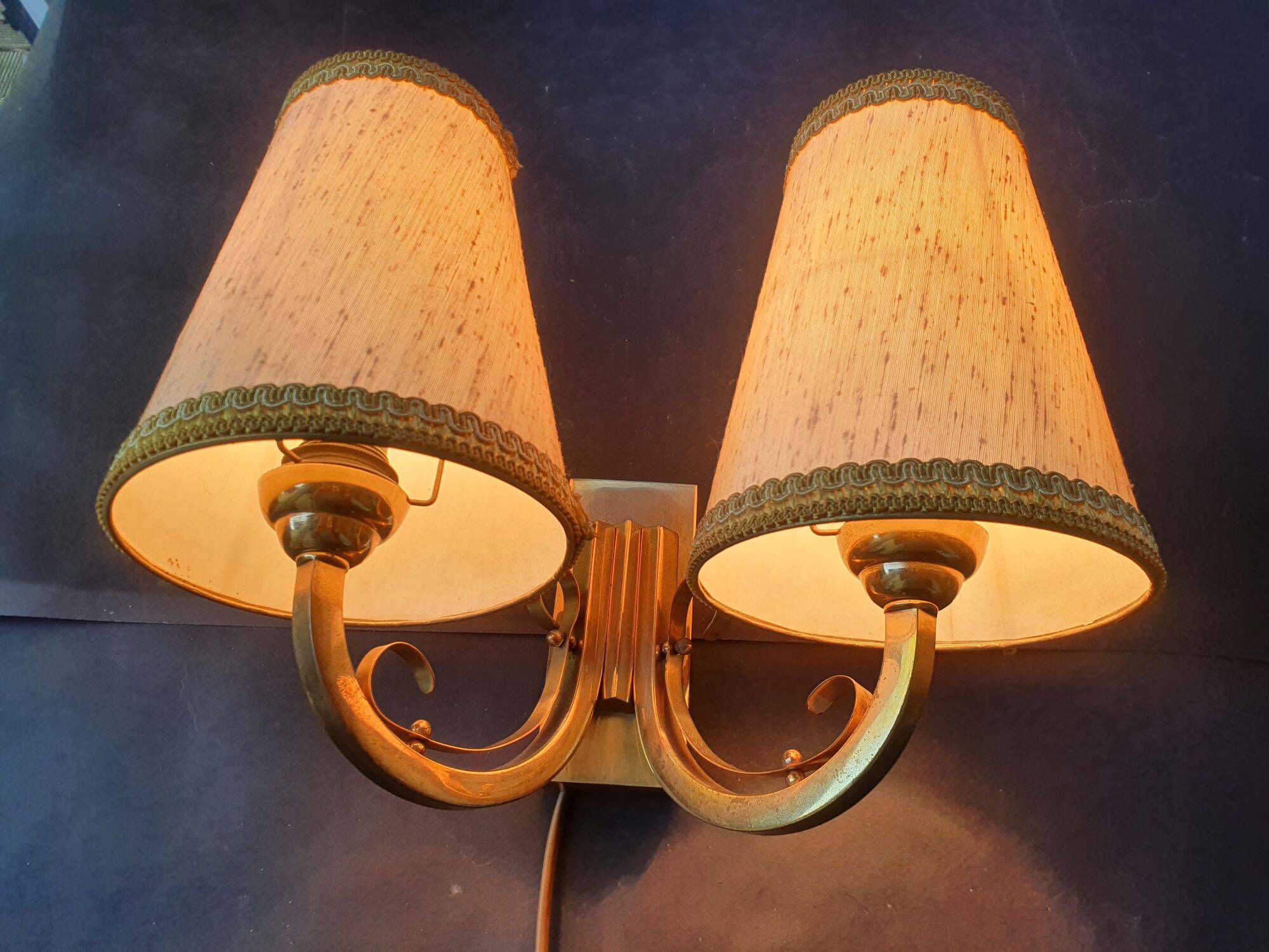 Pair of bronze wall sconces with 1940s Art Deco lampshades.
