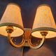 Pair of bronze wall sconces with 1940s Art Deco lampshades.