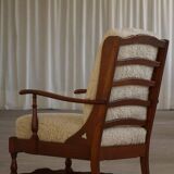 Modern Danish design, a pair of high-backed armchairs in oak and lambswool, 1950s.