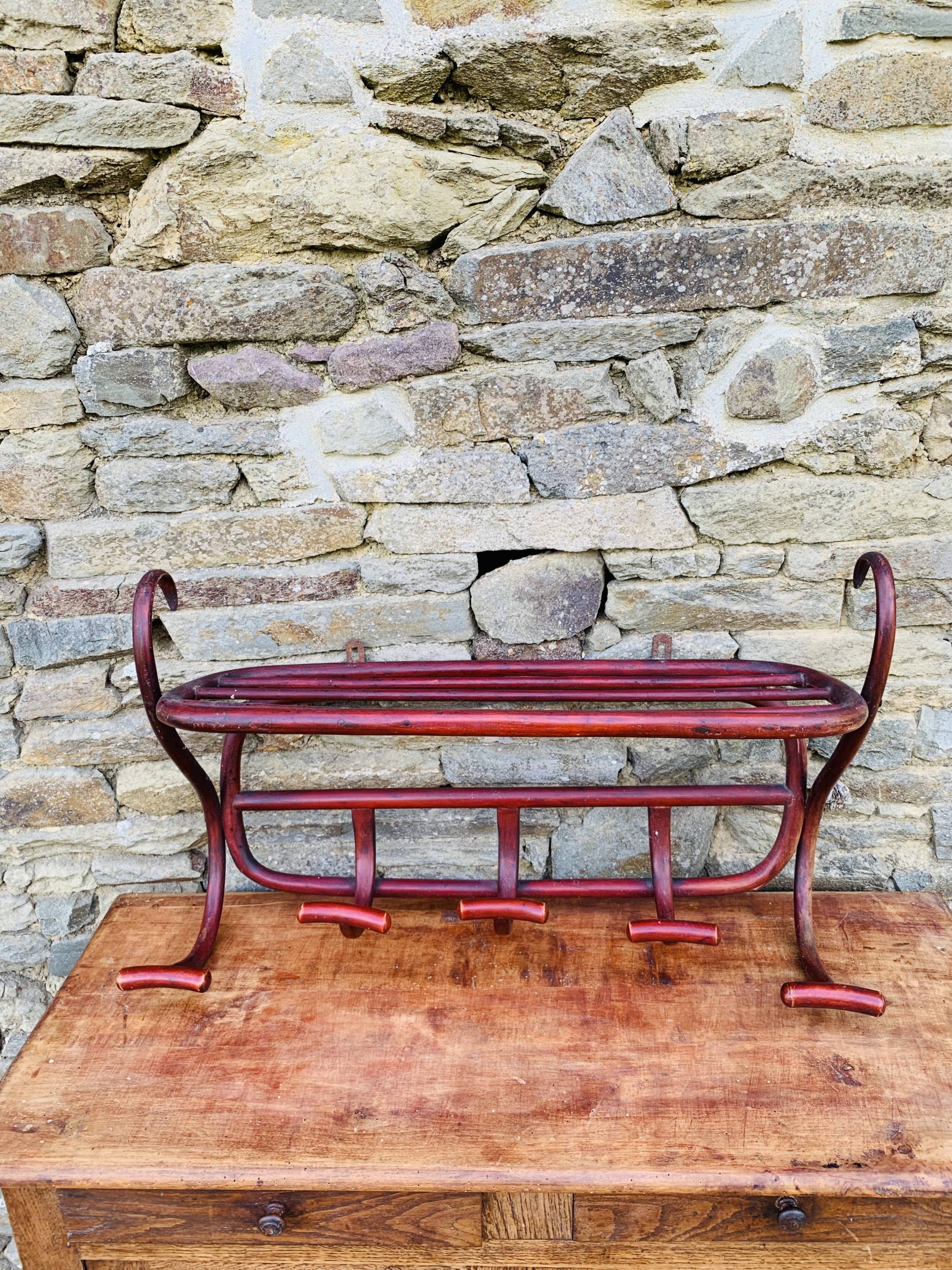 Antique curved wooden wall coat rack