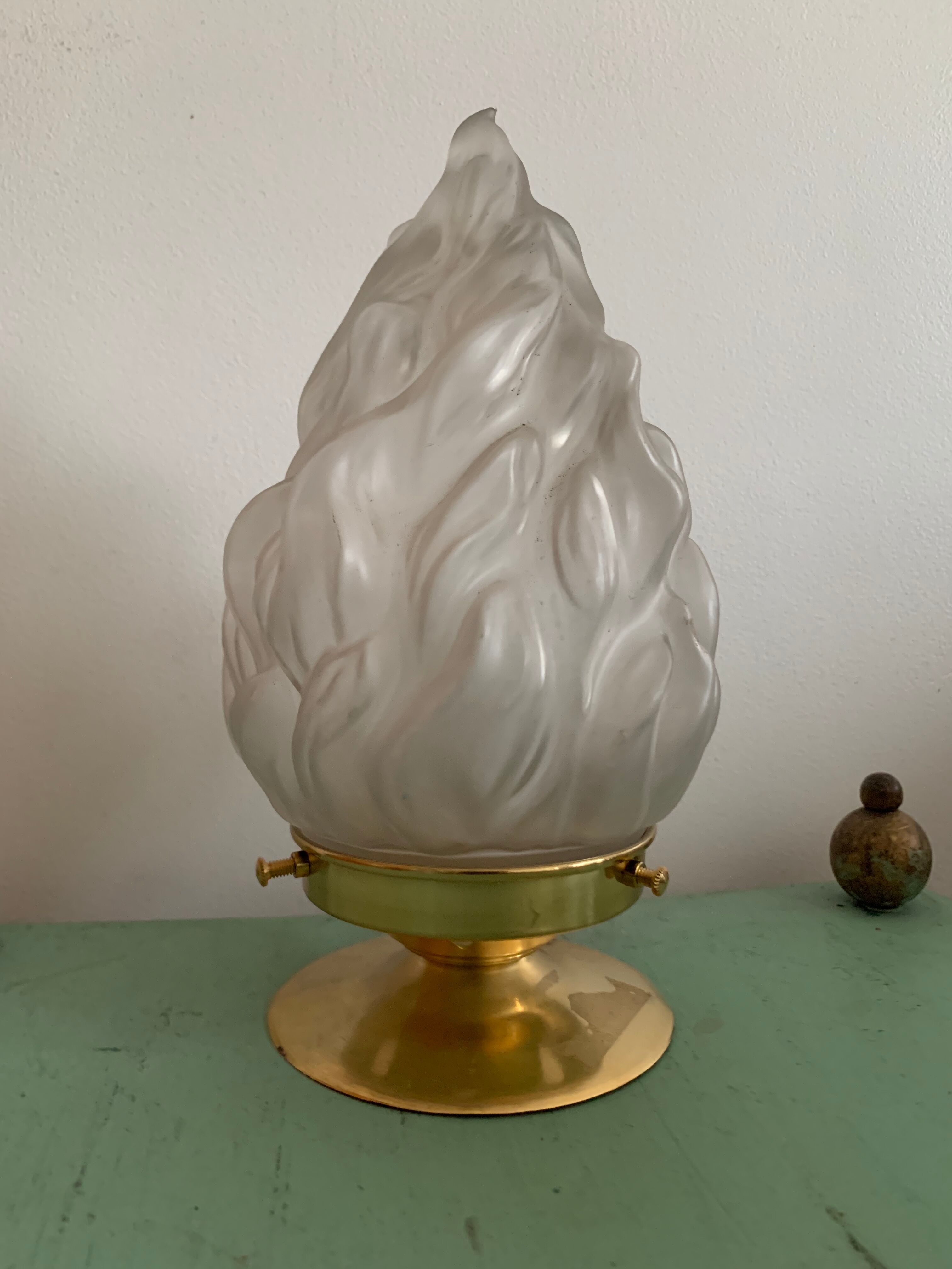 Old laying flame lamp