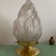 Old laying flame lamp