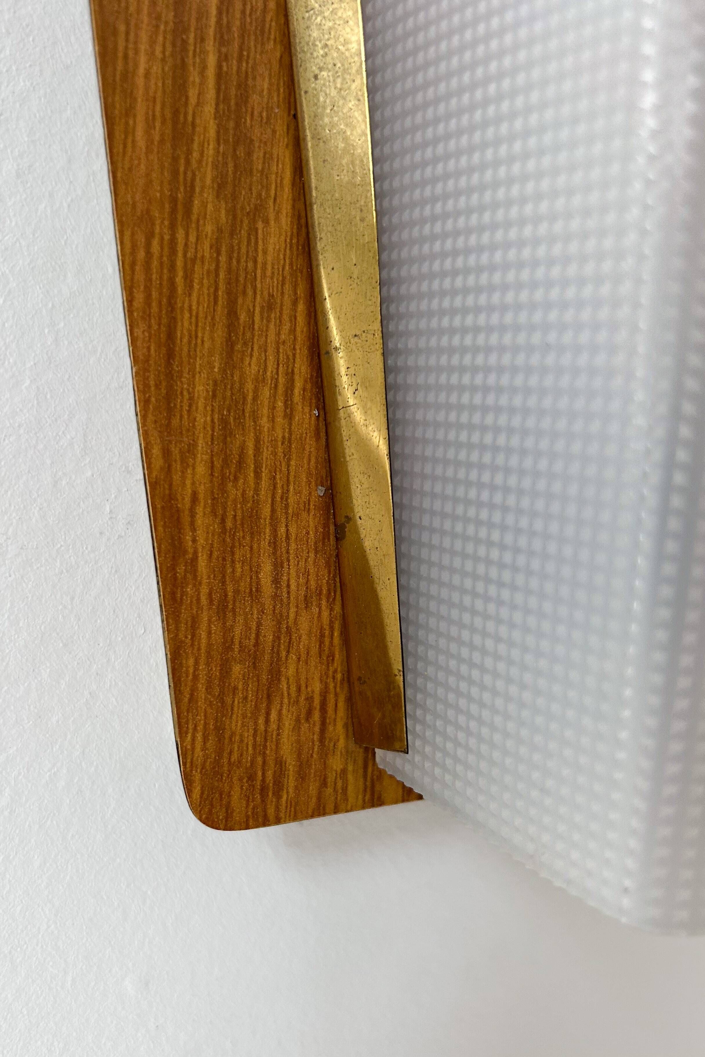 Pair of vintage perspex and wood wall lights, France 1960.