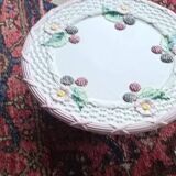 Footed dessert plate in barbotine porcelain, marked FG.