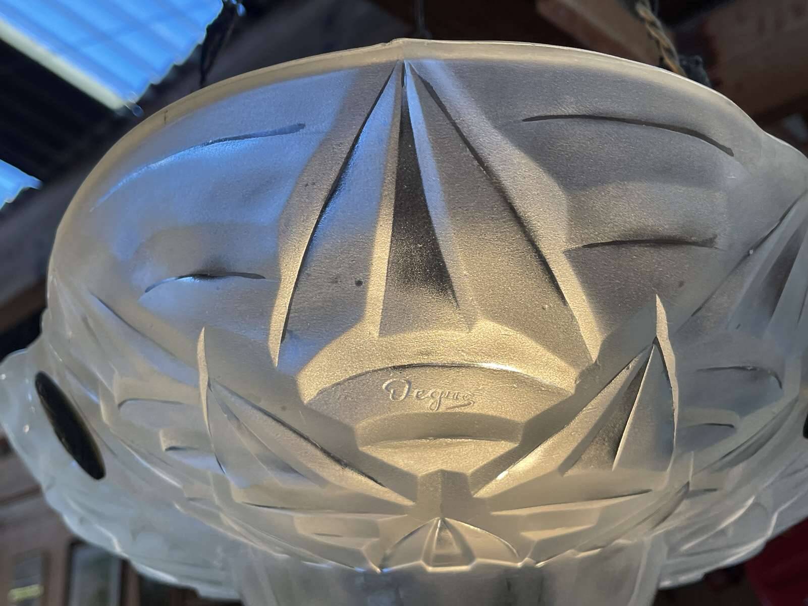 Art Deco suspension in moulded-pressed glass with geometric decoration signed Degué.