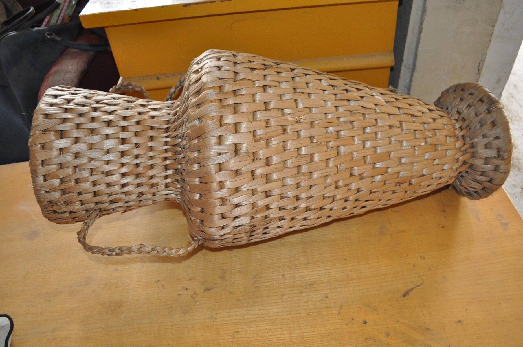 Large beige (wheat) woven wicker floor vase, Mid-Century style from the 1940s.