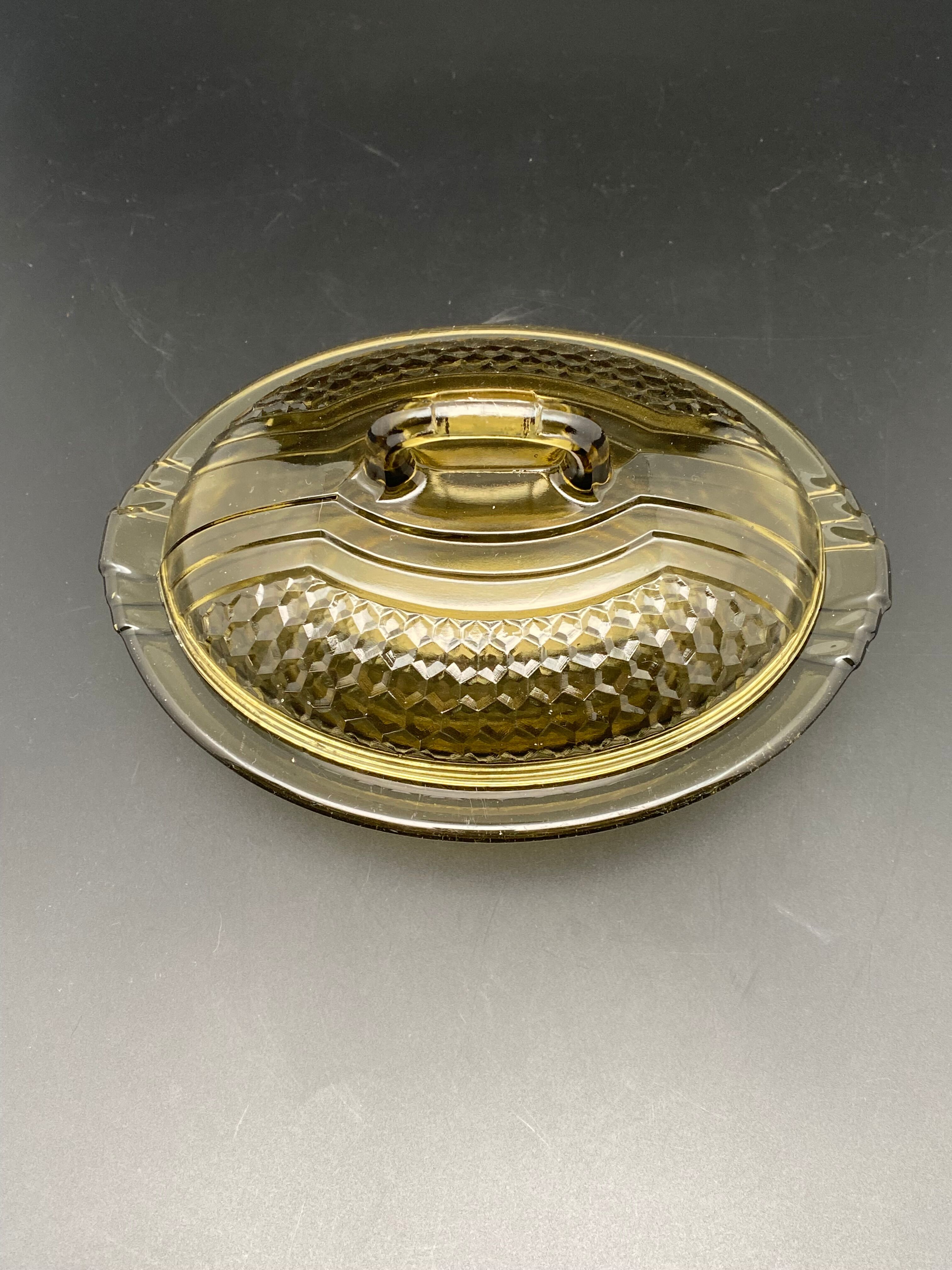 Butter dish or "little casserole" in black colored glass honeycomb pattern