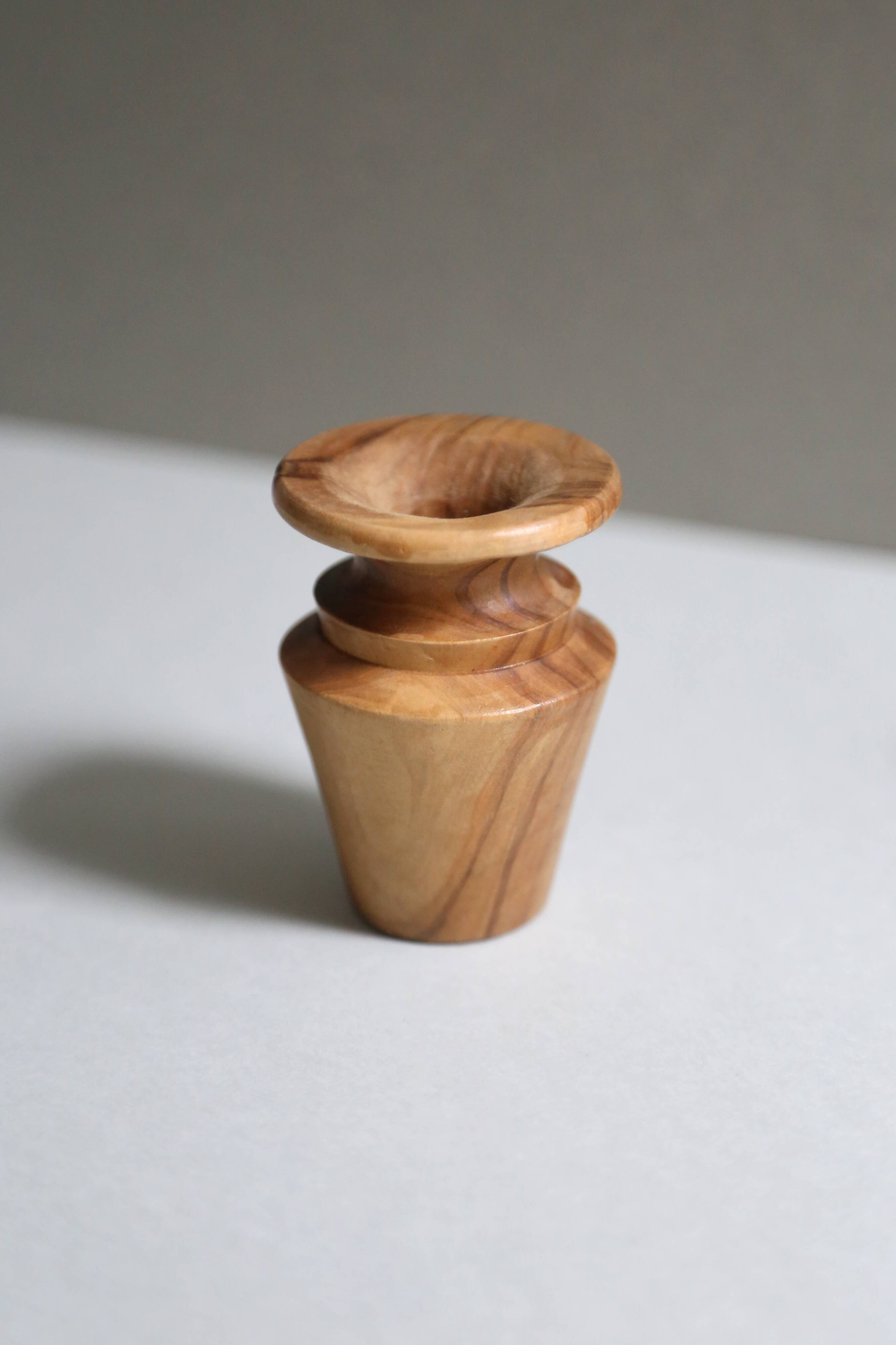 Turned raw wooden candlesticks