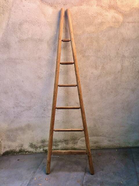 Wooden triangular ladder