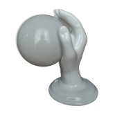 Ceramic wall lamp in the shape of a vintage hand