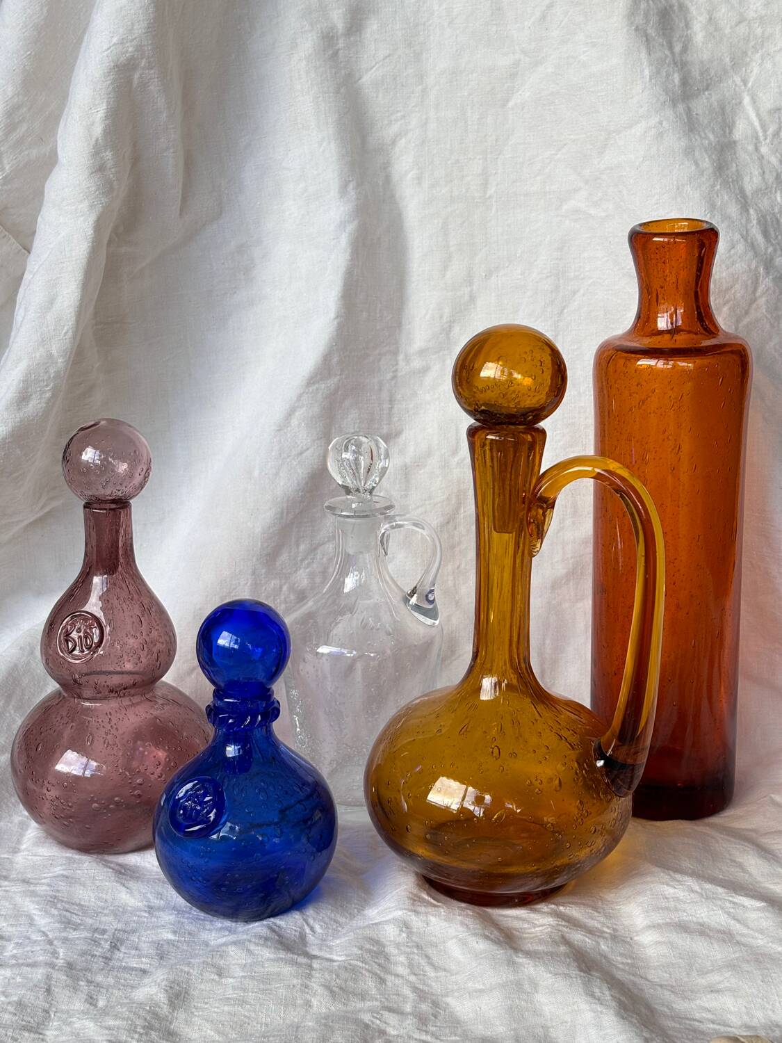 Biot blown glass bottle