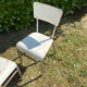 Pair of chairs in patinated white wood and metal structure