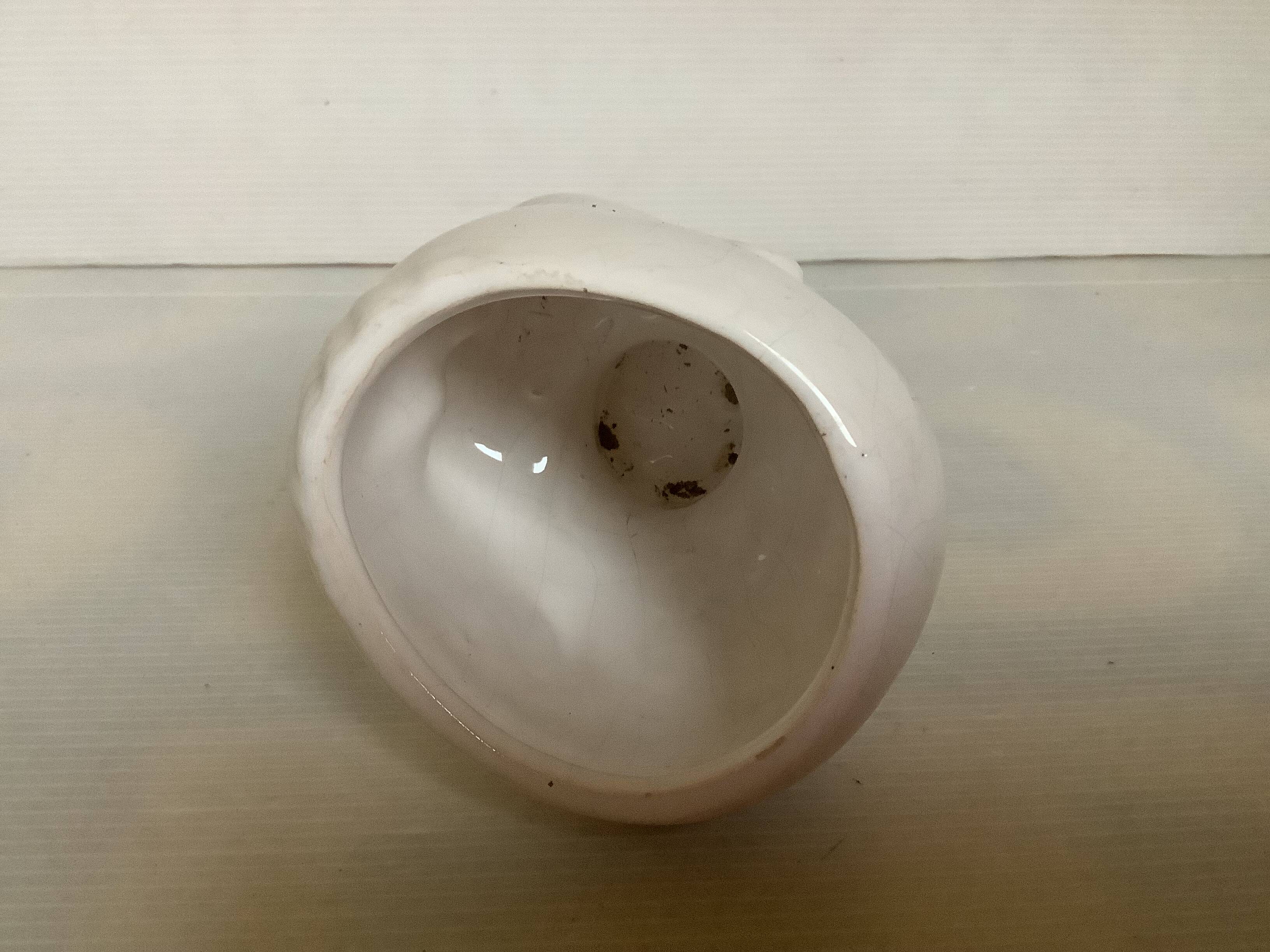 Baby doll shaped vase planter