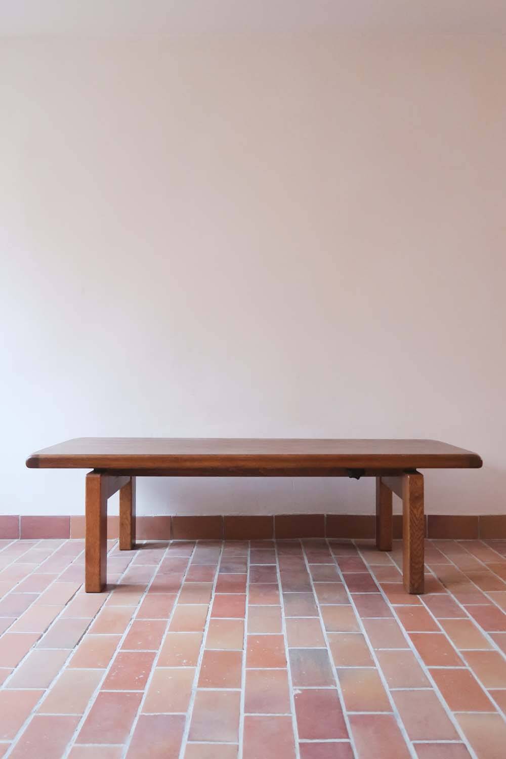 Large solid retractable coffee table